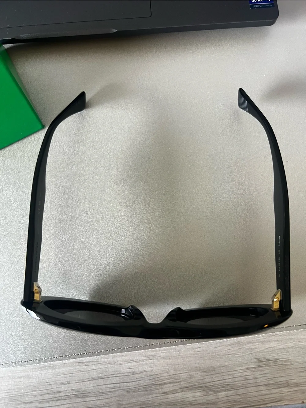 Bottega Veneta Black Oval Sunglasses with Dark Lenses